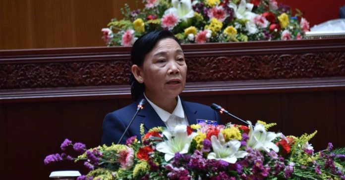 Deputy Minister of Industry and Commerce (MTC) Mrs. Chansouk Sengphachanh speaks on the 5th Ordinary Session of the National Assembly. (Photo: Paxason) 