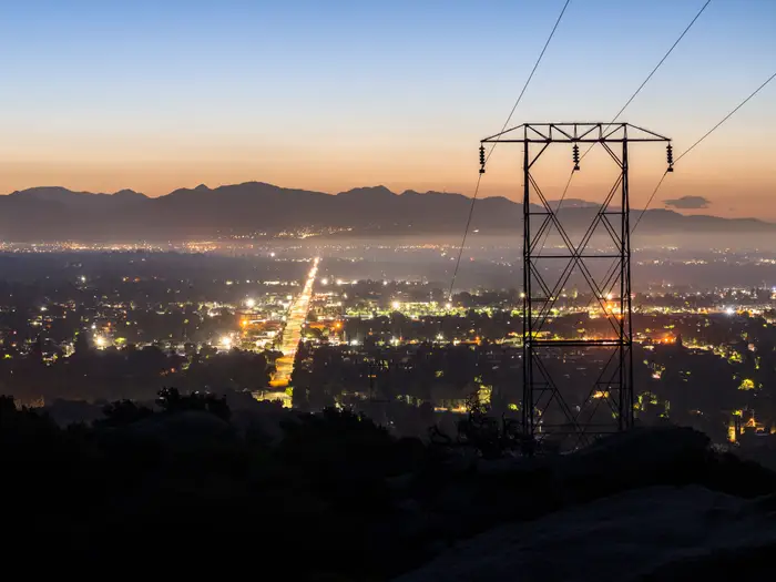 Replacing current power lines with room-temperature superconductive materials would make them far more efficient. (Image from Insider)