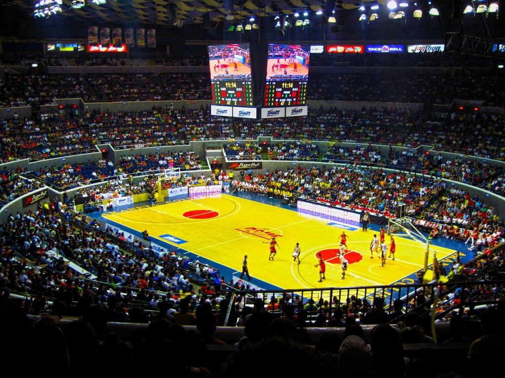 Caption: Araneta Coliseum in Quezon City will host Groups A, B, I, and M. From Caption: Mall of Asia Arena in Pasay will host Groups C, D, J, N and the Final Round. By WayKurat;