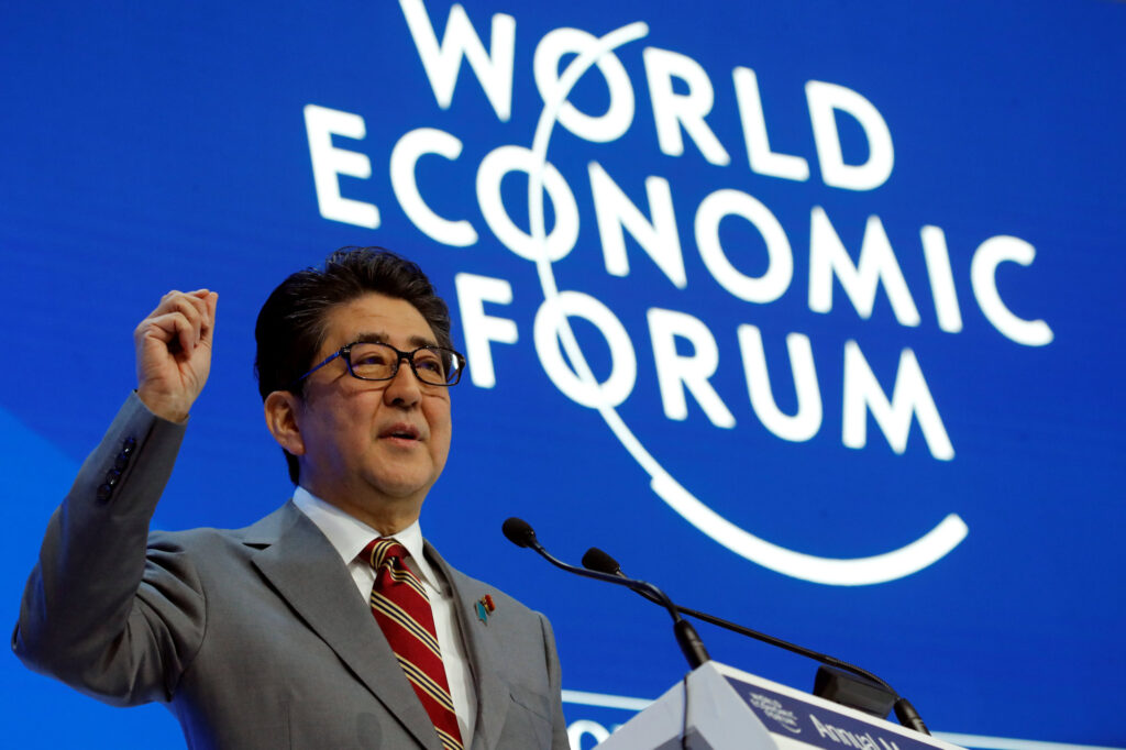 Prime Minister Shinzo Abe speaks at the World Economic Forum Annual Meeting in Davos, Switzerland, on Wednesday. (REUTERS)