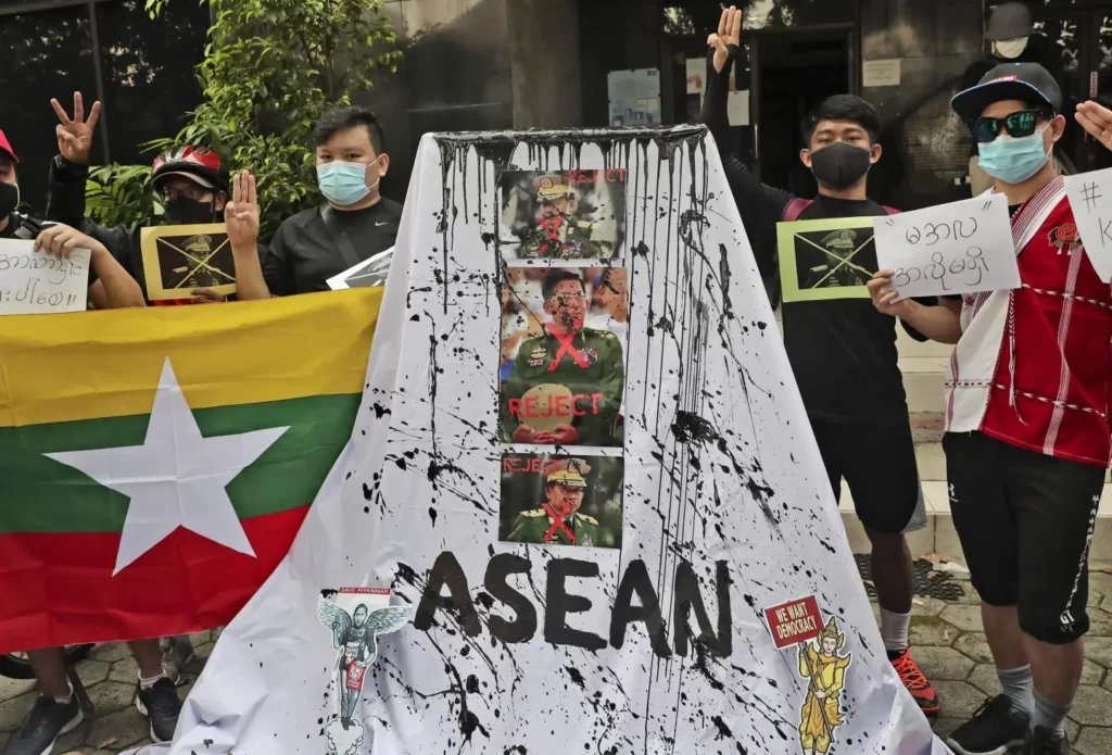 Activists in Jakarta 2021 calling to ASEAN to do more to end the violence by the military Junta in Myanmar (AP News)