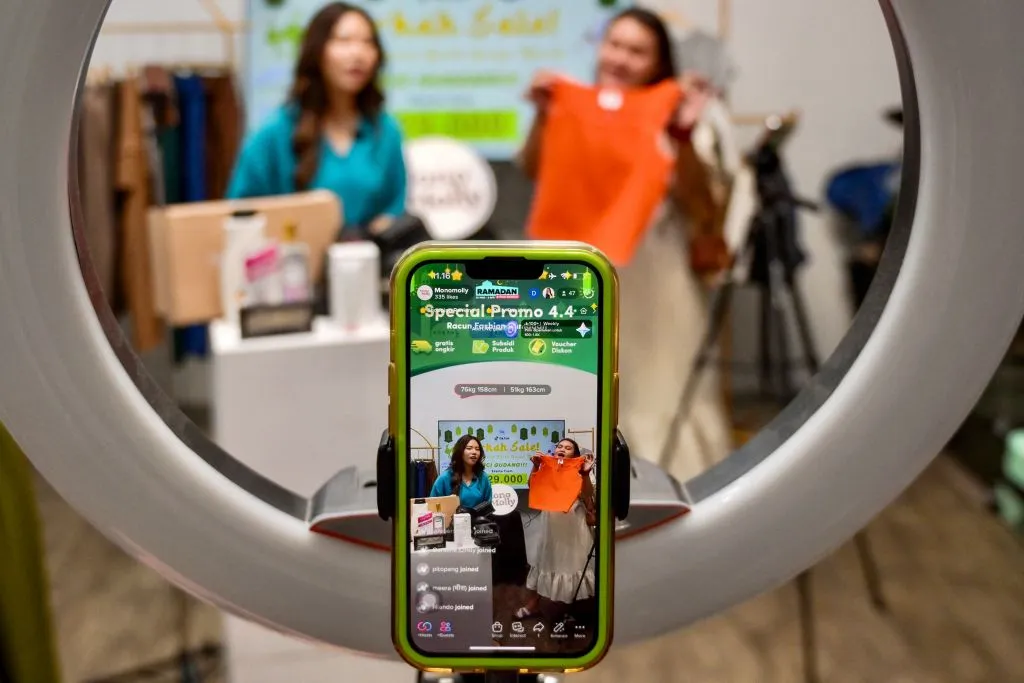 People selling merchandise through a TikTok livestream in Jakarta, April 4, 2023.Bay Ismoyo—AFP/Getty Images / time.com